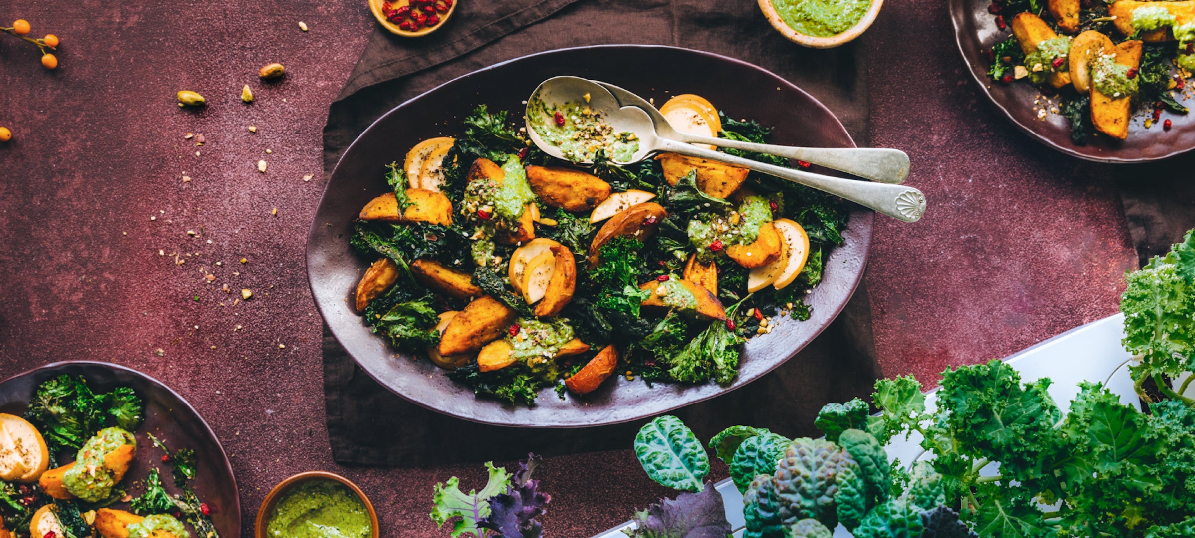 Roasted Turmeric Potatoes and crispy Kale with green Tahini Dressing and Pistachio Dukkah