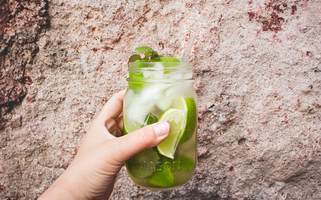 Lemon balm lemonade in a glass jar.