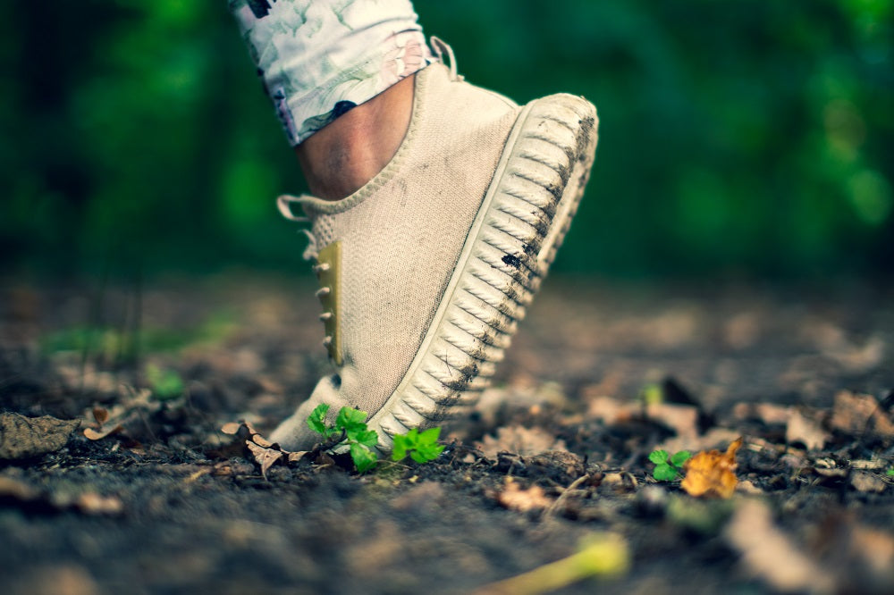 Closeup of a runner’s shoe.