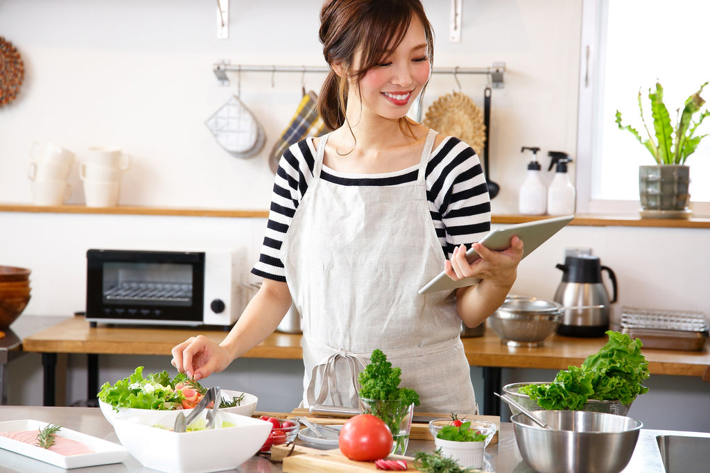 Home cook following a recipe and having fun cooking in the kitchen.